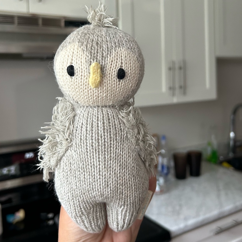 Cuddle and kind baby penguin